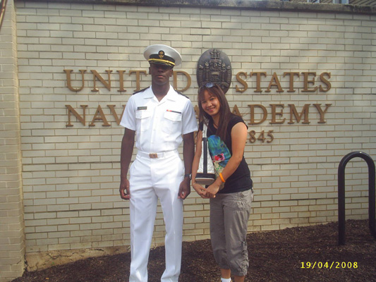 Remaning photos all show Ann or Nanta and Ann posing in front of the Naval Academy with cadets (students from the Academy).  In one of the photos, a cadet hugs Ann.